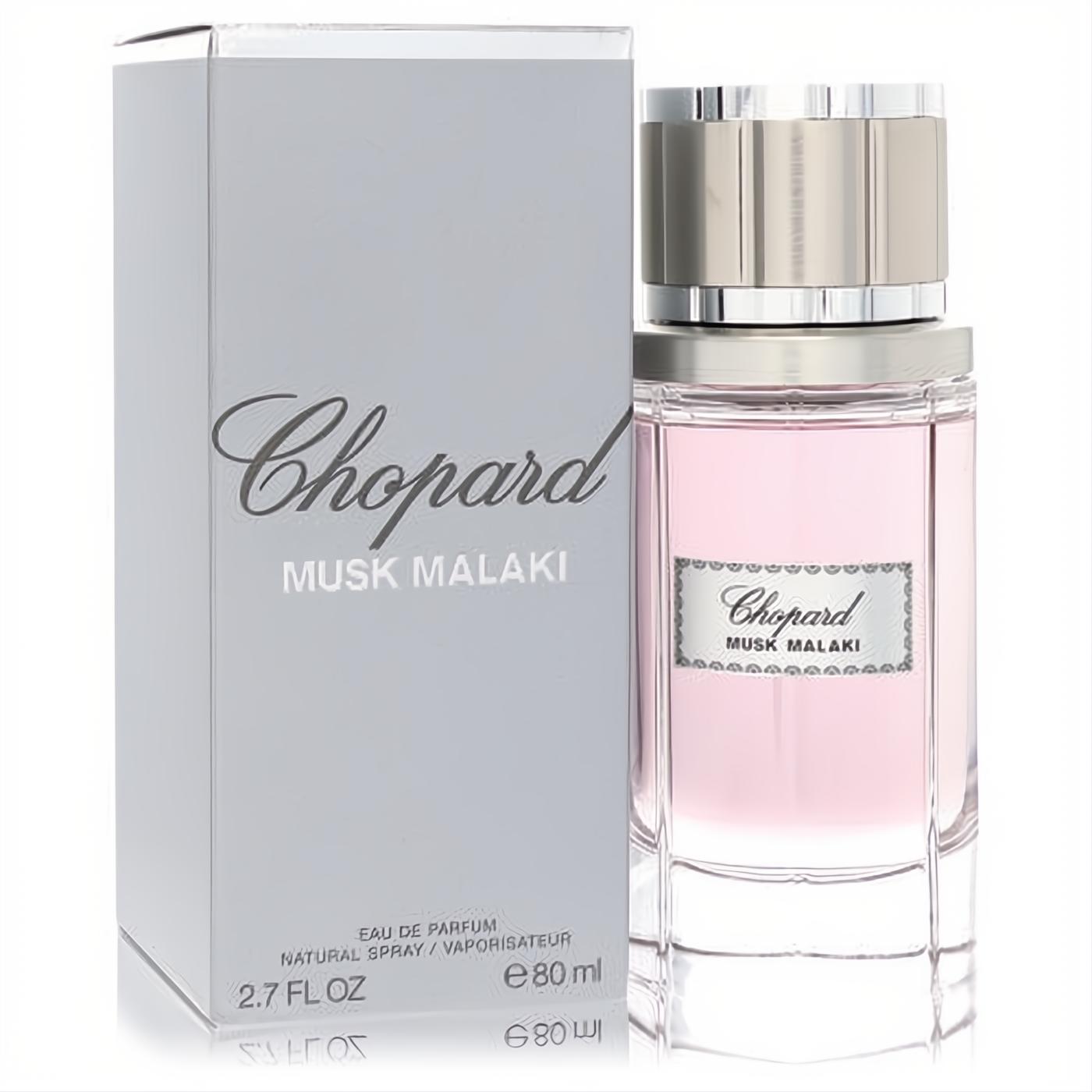 Chopard Musk Malaki 2.7 oz unisex Eau De Parfum. Elegant pink fragrance in a clear glass bottle with silver cap, beside its luxurious silver box.