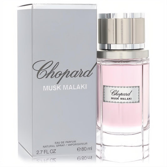 Chopard Musk Malaki 2.7 oz unisex Eau De Parfum. Elegant pink fragrance in a clear glass bottle with silver cap, beside its luxurious silver box.