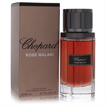 Chopard Rose Malaki 2.7 oz EDP: elegant rose-taupe box, clear glass bottle with captivating deep red fragrance and black ribbed cap.