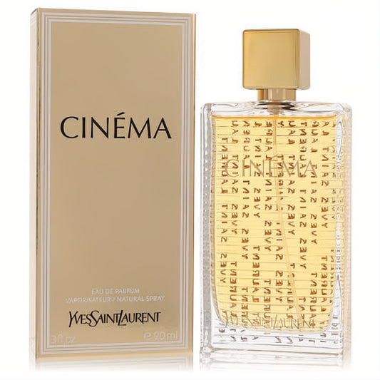 Elegant YSL Cinema Eau De Parfum 3 oz spray. Golden liquid in a clear, textured glass bottle with a gold cap, next to its luxurious gold box.