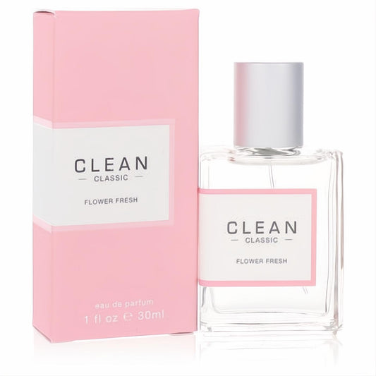 Experience Clean Classic Flower Fresh 1 oz EDP. Clear glass spray bottle, sleek silver cap, and chic pink box.