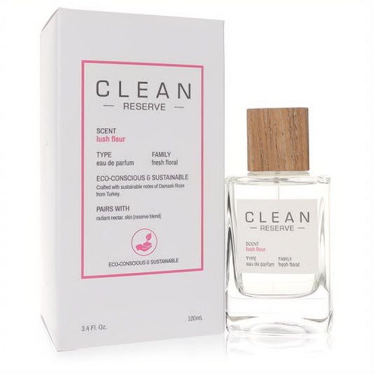 Clean Reserve Lush Fleur 3.4 oz fresh floral EDP. Clear glass bottle with natural wood cap, displayed with its white eco-conscious box.