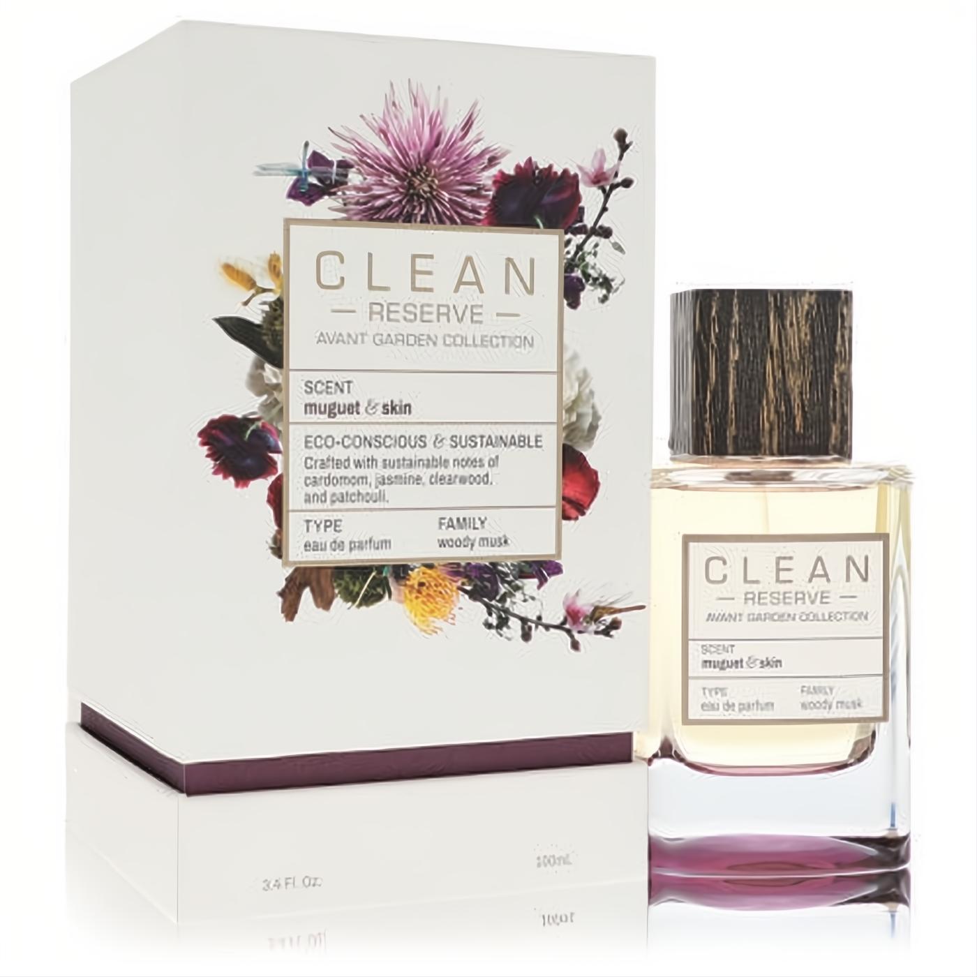 Clean Reserve Muguet & Skin 3.4 oz EDP. Clear bottle with amber liquid, dark wood cap, and elegant floral box.