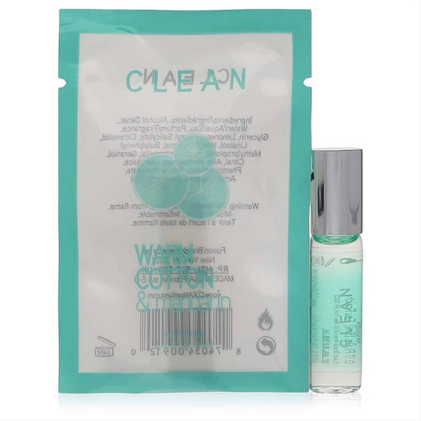 Experience Clean Warm Cotton & Mandarine .17 oz mini rollerball perfume. Clear glass bottle, silver cap, light green liquid, with vibrant teal pouch.