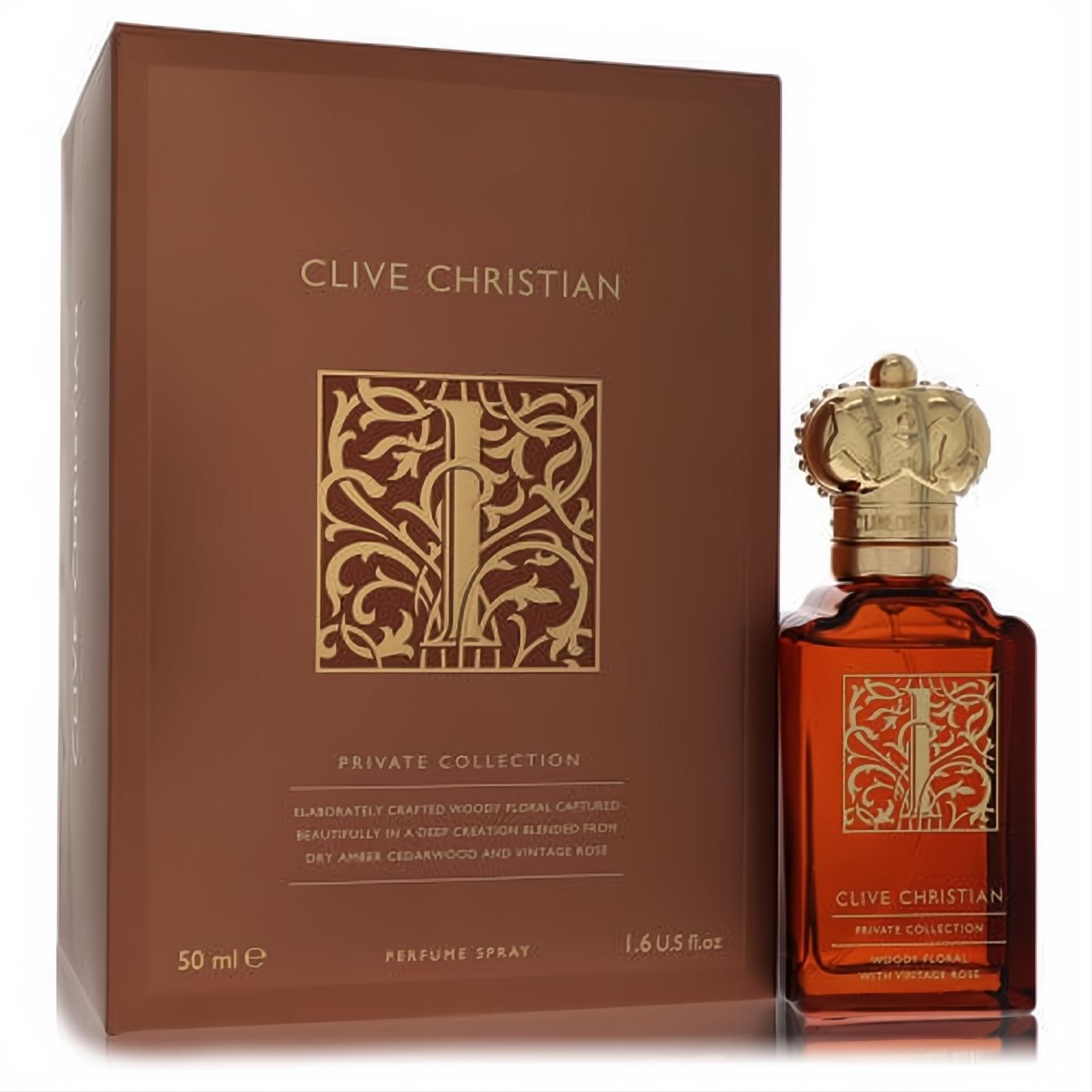 Clive Christian I Woody Floral 1.6oz perfume bottle with ornate gold crown cap next to its elegant brown box.
