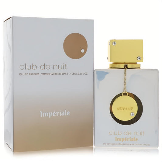 Luxurious Club De Nuit Imperiale 3.6 oz perfume bottle, radiant white with a sparkling gold crystal cap and charm.