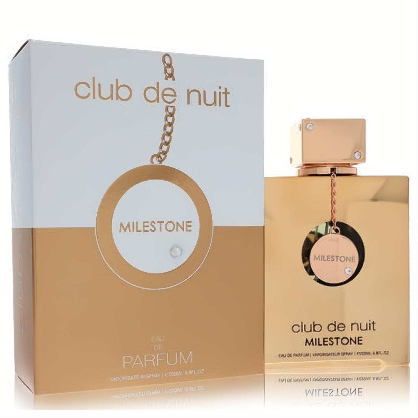 Luxurious Armaf Club De Nuit Milestone 6.7 oz EDP spray. Features a sleek gold bottle with a distinctive chain tag and elegant white & gold packaging.