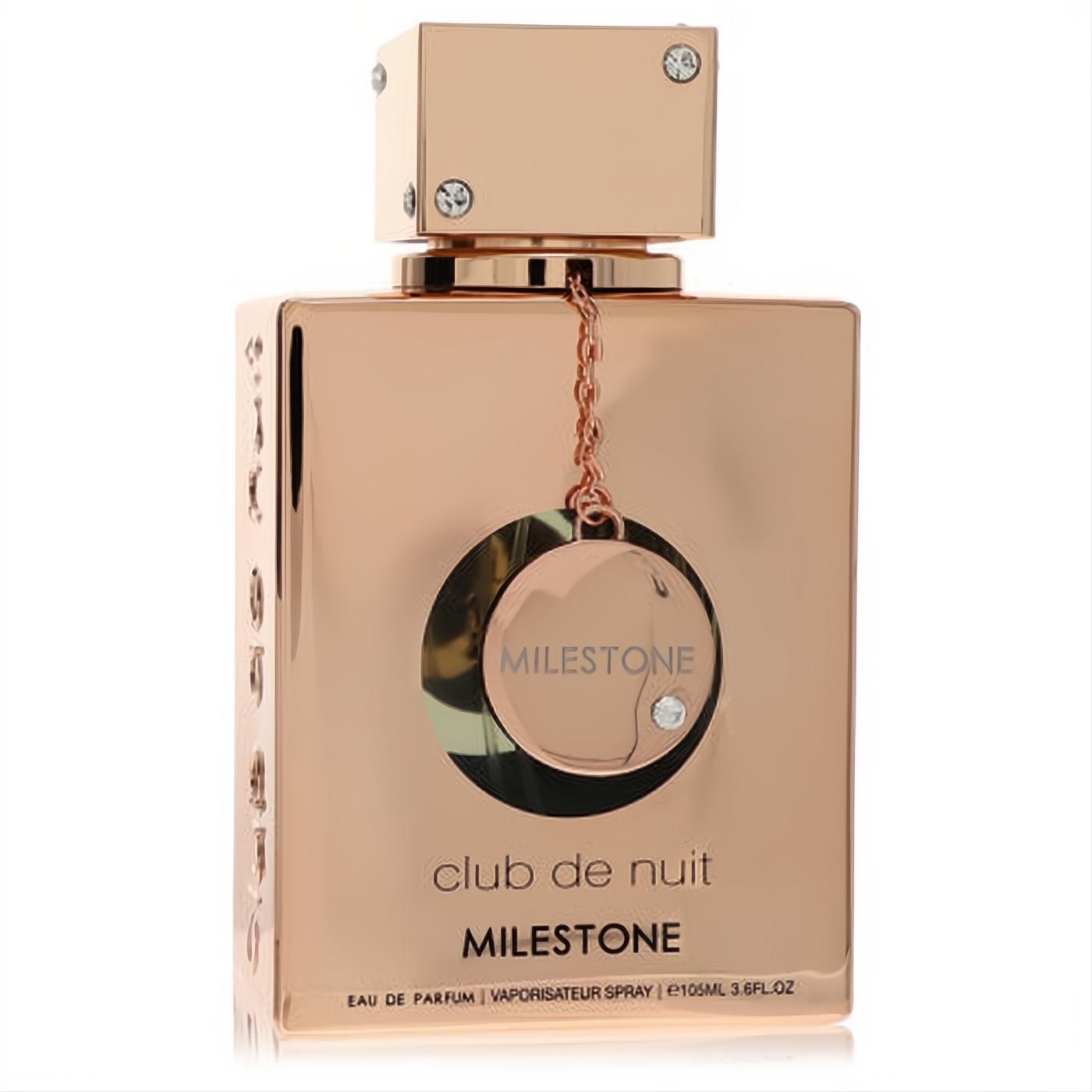 Luxurious rose gold Armaf Club De Nuit Milestone 3.6 oz EDP spray bottle with elegant chain and sparkling gem details.