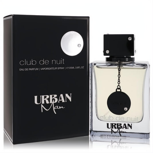 Armaf Club De Nuit Urban Man 3.4 oz EDP. Elegant black box and clear bottle with light amber liquid, bold black cap, and chain detail.