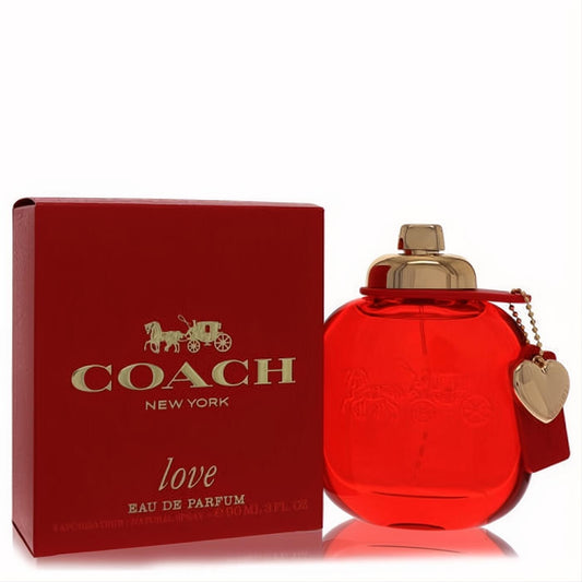 Coach Love 3 oz Eau De Parfum: luxurious red bottle with gold cap, heart charm, and matching red box.