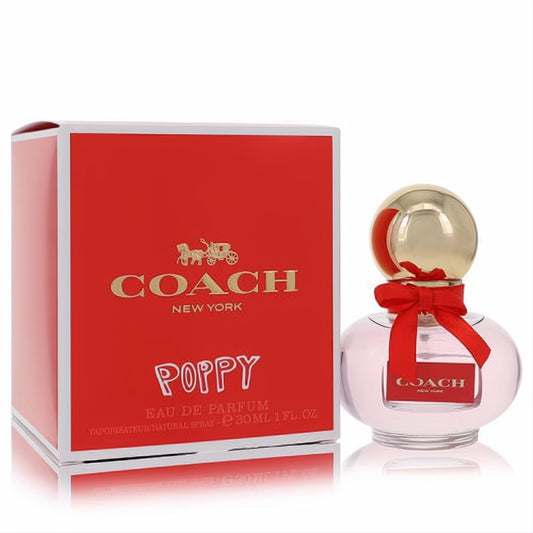 Elegant Coach Poppy 1 oz Eau De Parfum spray, featuring a clear glass bottle, gold cap, red ribbon, and bold red box.