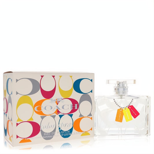 Coach Signature Color 3.3 oz EDP spray. Clear glass bottle with vibrant orange, yellow, red charm tags, next to its iconic C-logo box.