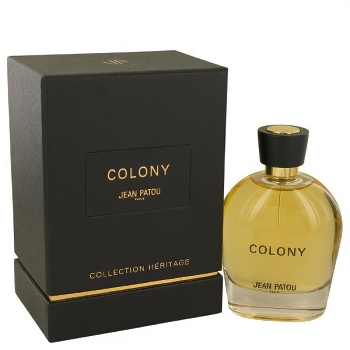 Elegant Jean Patou Colony Eau De Parfum with amber liquid in a clear glass bottle, black and gold cap, beside its luxurious black box.