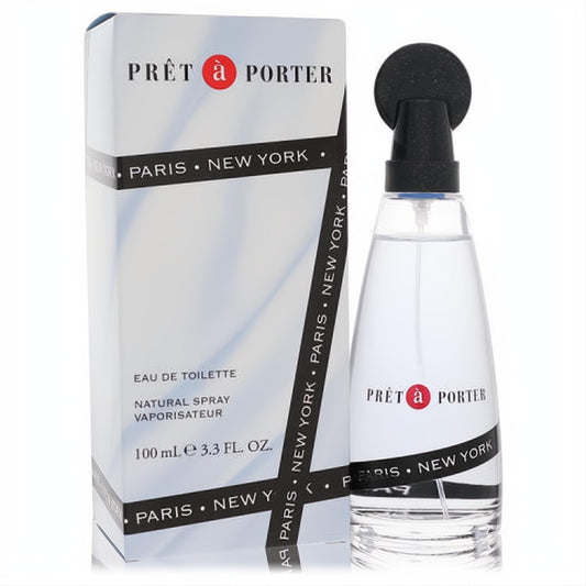 Coty Pret A Porter 3.3 oz Eau De Toilette. Elegant clear glass bottle with black spray top and "Paris New York" band, next to its sleek white box.