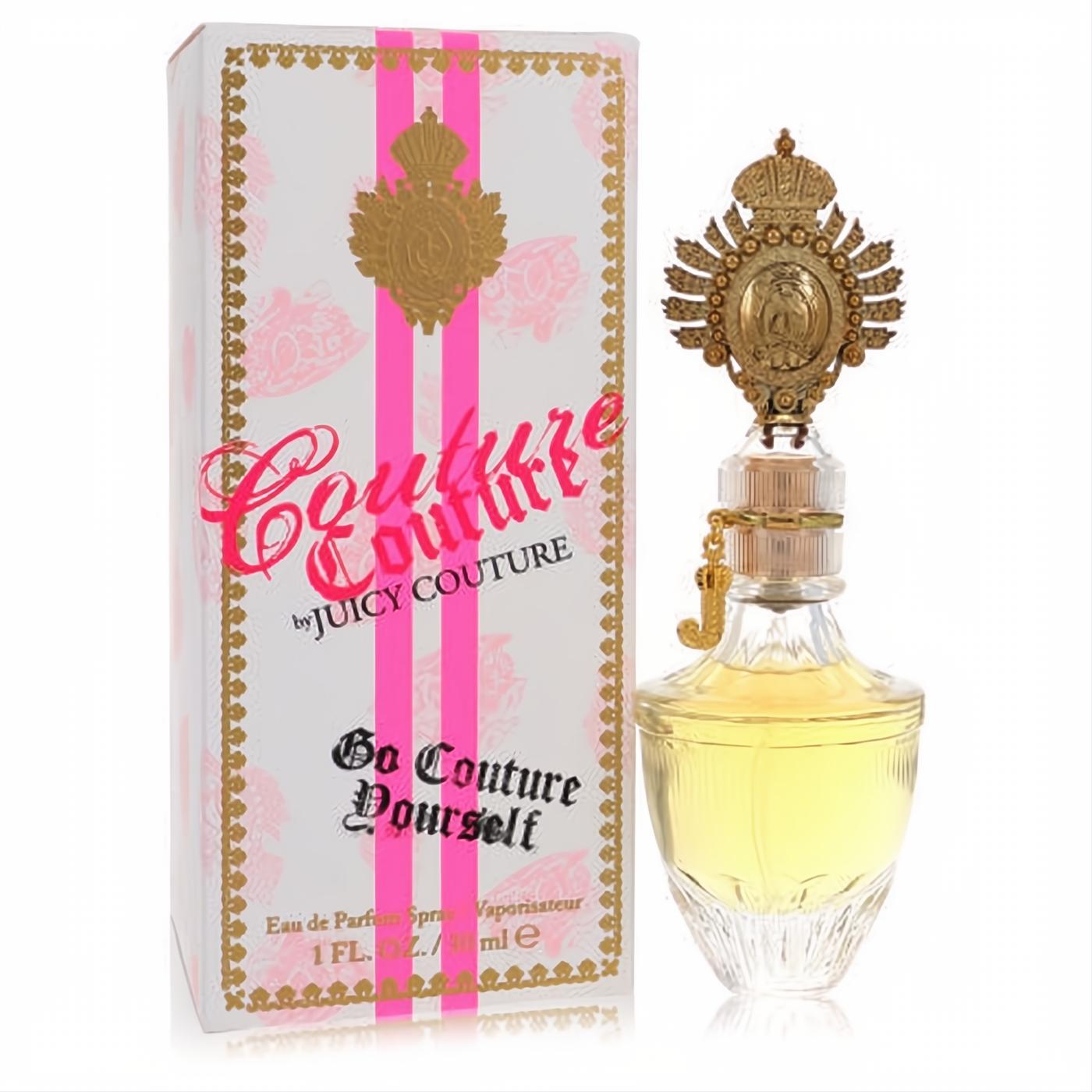 Iconic Juicy Couture Couture Couture 1 oz EDP. Clear faceted bottle, ornate gold crown cap with 'J' charm, vibrant pink striped box.