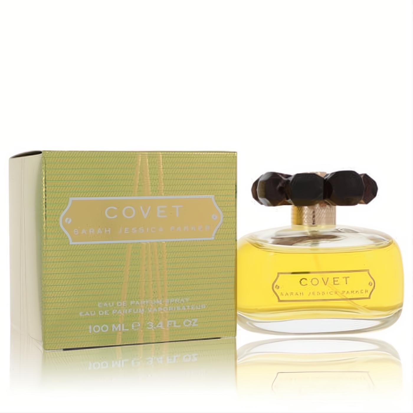 Elegant Covet by Sarah Jessica Parker 3.4 oz Eau De Parfum spray. Clear glass bottle, dark floral cap, and textured gold-green box.