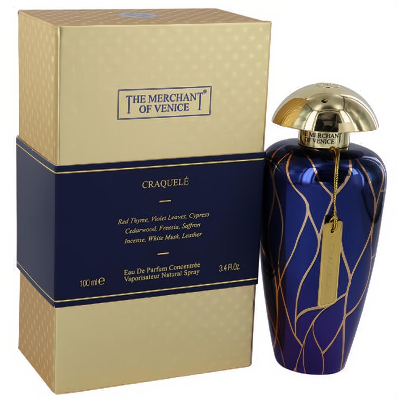 Exquisite Craquele 3.4 oz unisex perfume. Captivating deep blue bottle with unique gold swirls, paired with its elegant gold box.**