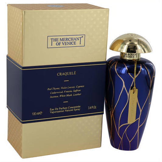 Exquisite Craquele 3.4 oz unisex perfume. Captivating deep blue bottle with unique gold swirls, paired with its elegant gold box.**