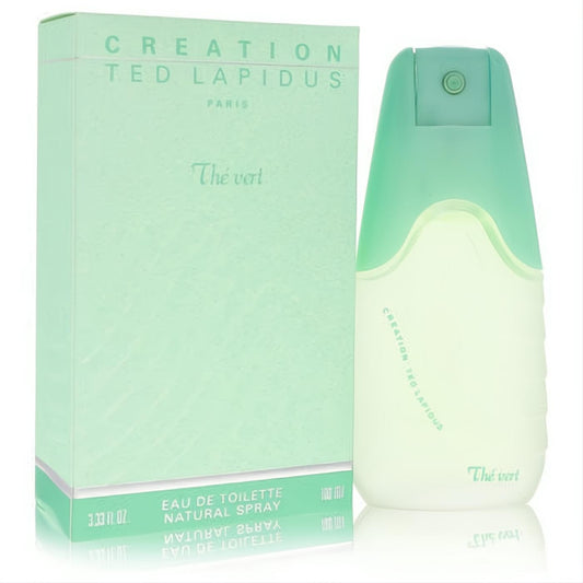 Captivating Ted Lapidus Creation The Vert 3.3 oz EDT. Unique frosted green bottle with mint cap, displayed with its stylish box.