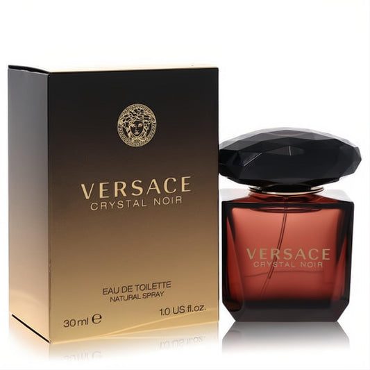 Elegant Versace Crystal Noir 1 oz women's EDT spray with a dark amber bottle, faceted black cap, and luxurious black-gold box.