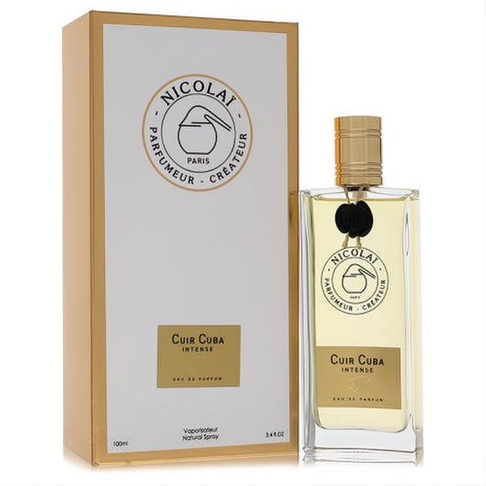 Clear glass Nicolai Cuir Cuba Intense 3.4 oz unisex perfume bottle with gold cap, black accent, and elegant white & gold box.