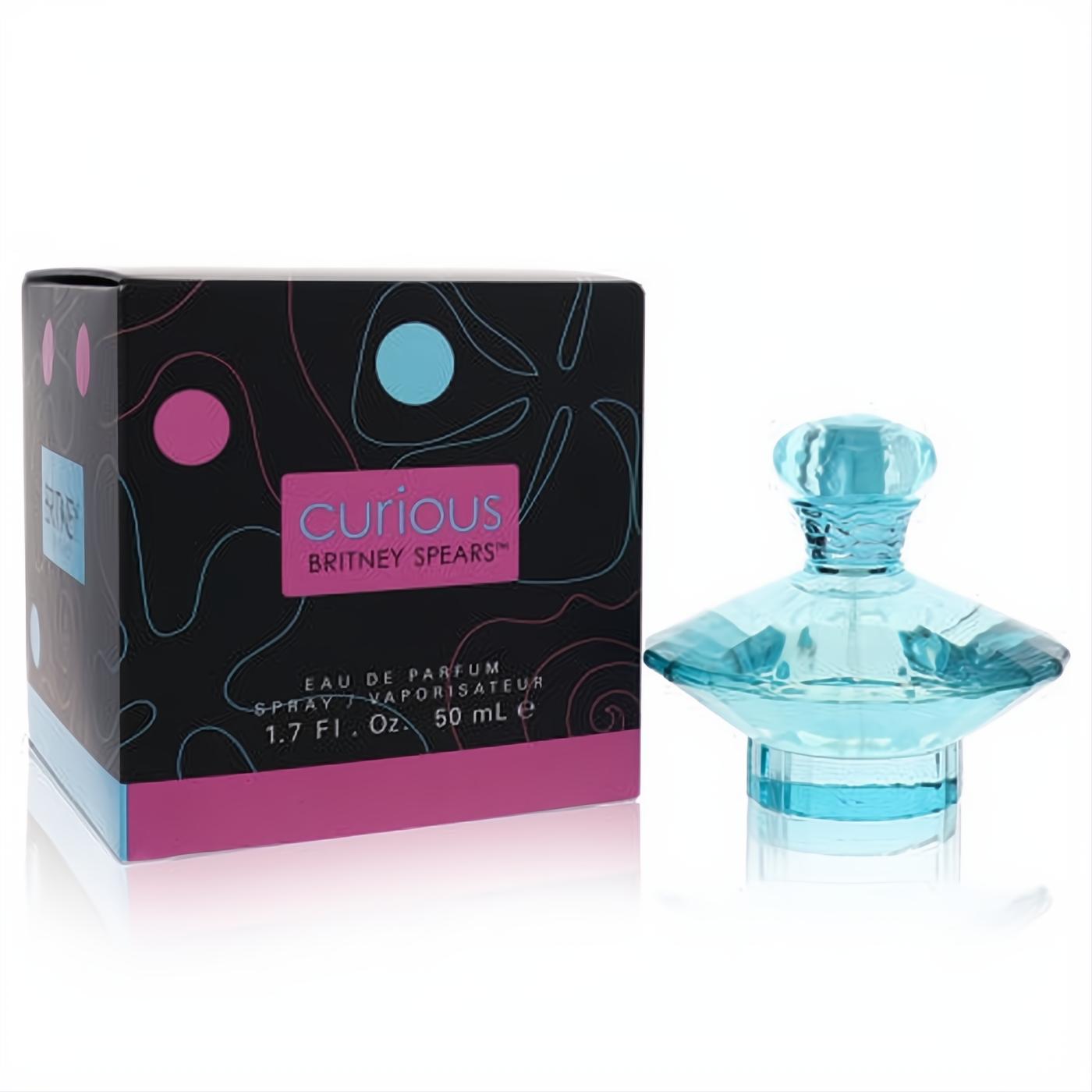 Curious by Britney Spears Eau de Parfum. Iconic light blue glass bottle with faceted cap, beside its vibrant black & pink box.