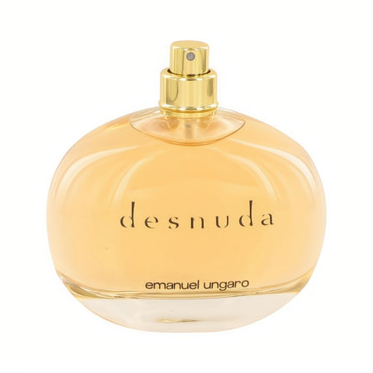 Elegant Desnuda by Ungaro 3.4 oz EDP tester. Clear round glass bottle with warm amber liquid and luxurious gold sprayer.