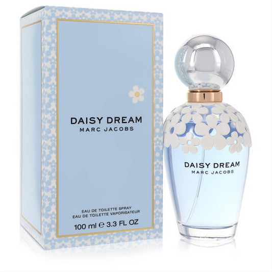 Marc Jacobs Daisy Dream 3.3 fl oz EDT. Captivating light blue bottle adorned with white daisies, silver cap, beside its elegant floral box.