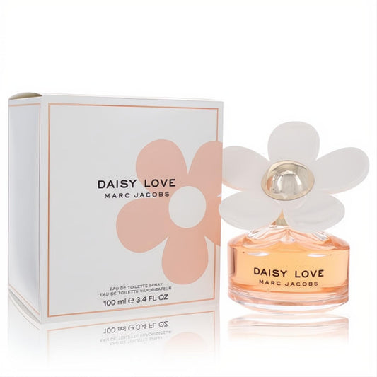 Marc Jacobs Daisy Love 3.4 oz EDT spray. Clear bottle with a playful white daisy cap, filled with a warm peach fragrance, next to its elegant box.