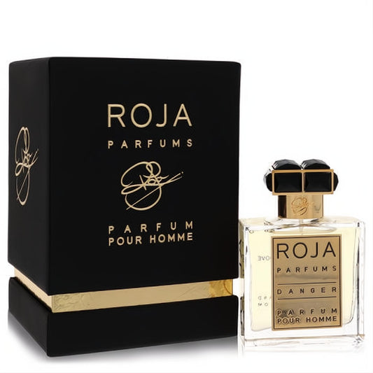 Luxurious Roja Parfums Danger Pour Homme 1.7 oz EDP. Elegant clear glass bottle with ornate black and gold cap, beside its sleek black and gold box.