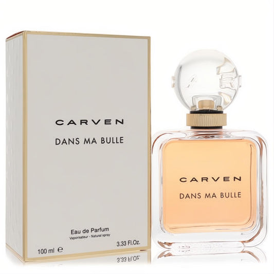 Carven Dans Ma Bulle 3.33 oz EDP spray. Elegant clear bottle with peach fragrance, gold accents, and a distinctive bubble cap.