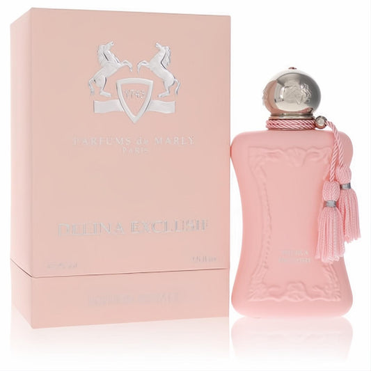 Elegant pink Delina Exclusif perfume bottle by Parfums de Marly, with silver cap, ornate design, and delicate tassels, beside its box.