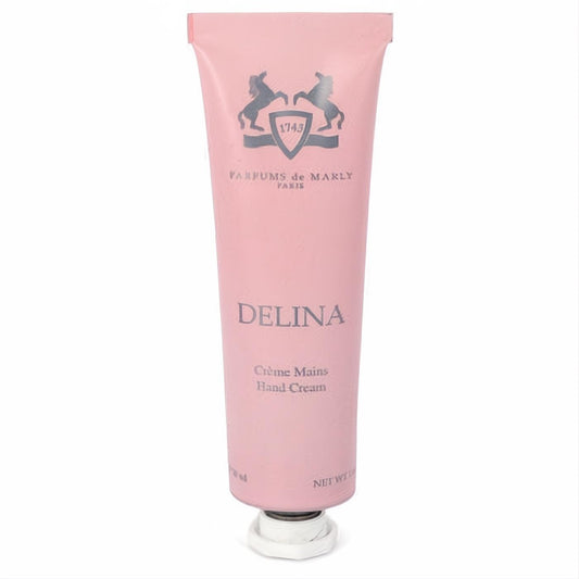 Delina by Parfums De Marly 1 oz pink hand cream tube. Features elegant horse logo and 'Crème Mains' for luxurious pampering.