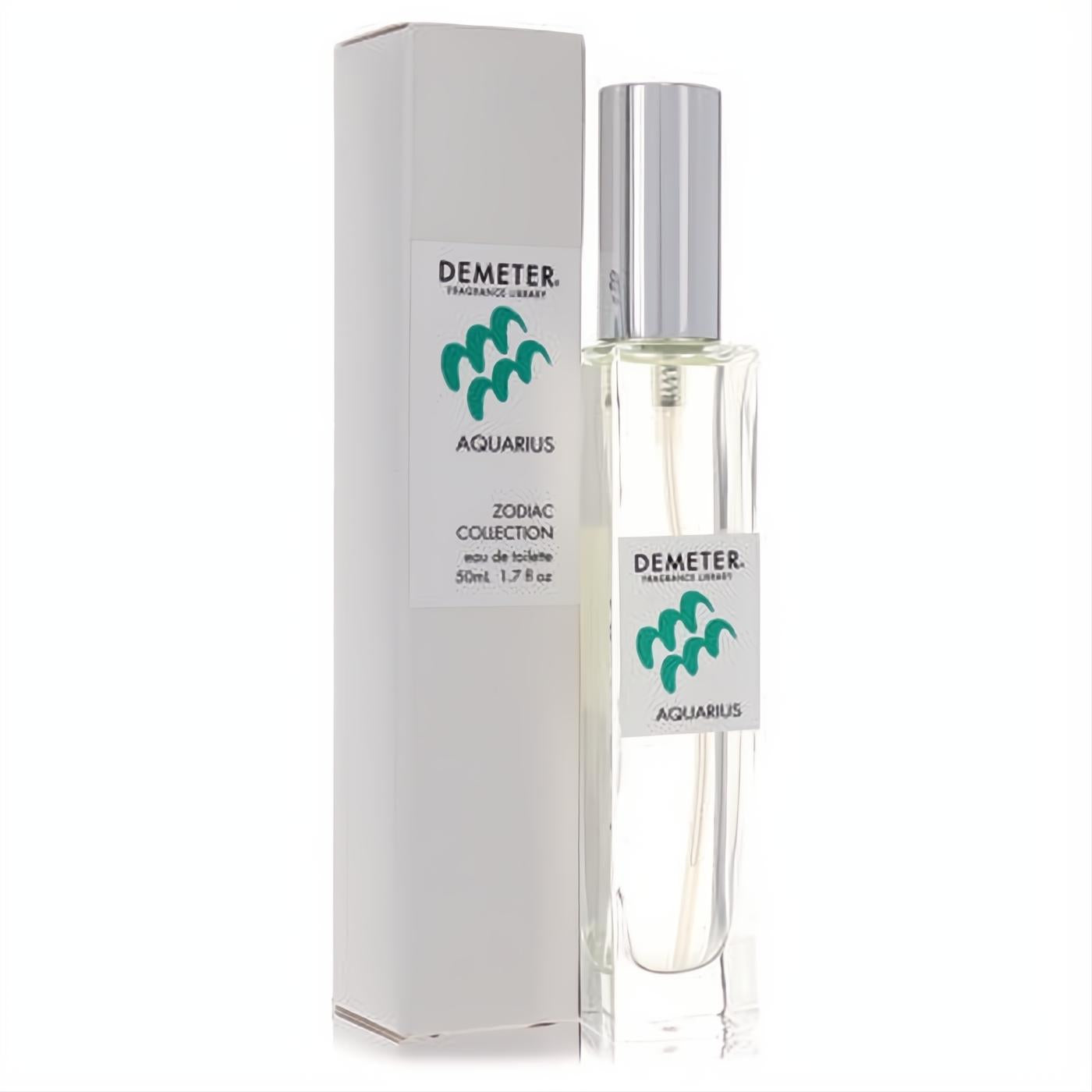 Demeter Aquarius 1.7 oz unisex Eau De Toilette spray. Clear glass bottle with silver cap, beside its white Zodiac Collection box with green logo.