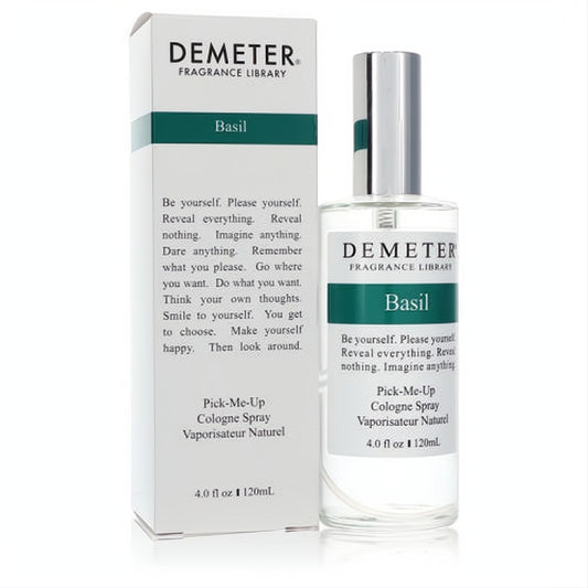 Demeter Basil 4 oz unisex cologne. Clear glass spray bottle with sleek silver cap, crisp white & green label, next to its matching box.