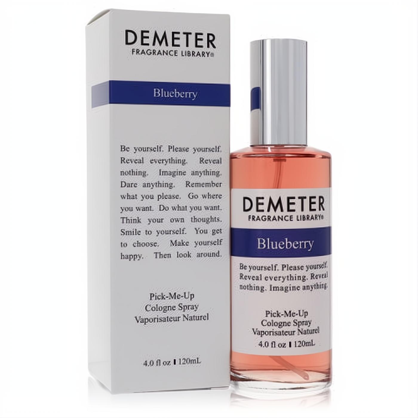Demeter Blueberry 4 oz cologne spray, clear bottle with refreshing peach liquid, silver cap, and elegant white box with blue label.