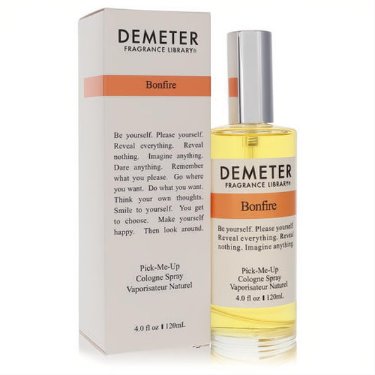 Demeter Bonfire 4 oz cologne spray in a clear glass bottle with orange label and silver cap, presented with its crisp white box.