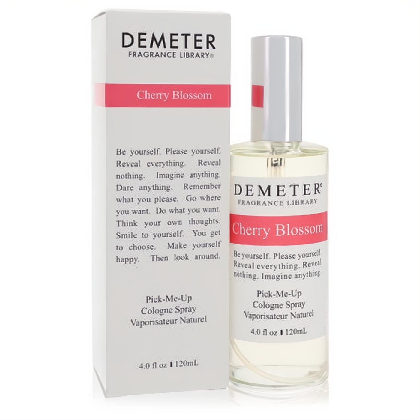 Demeter Cherry Blossom 4 oz cologne spray: clear glass bottle with silver cap, next to its elegant white and pink box.