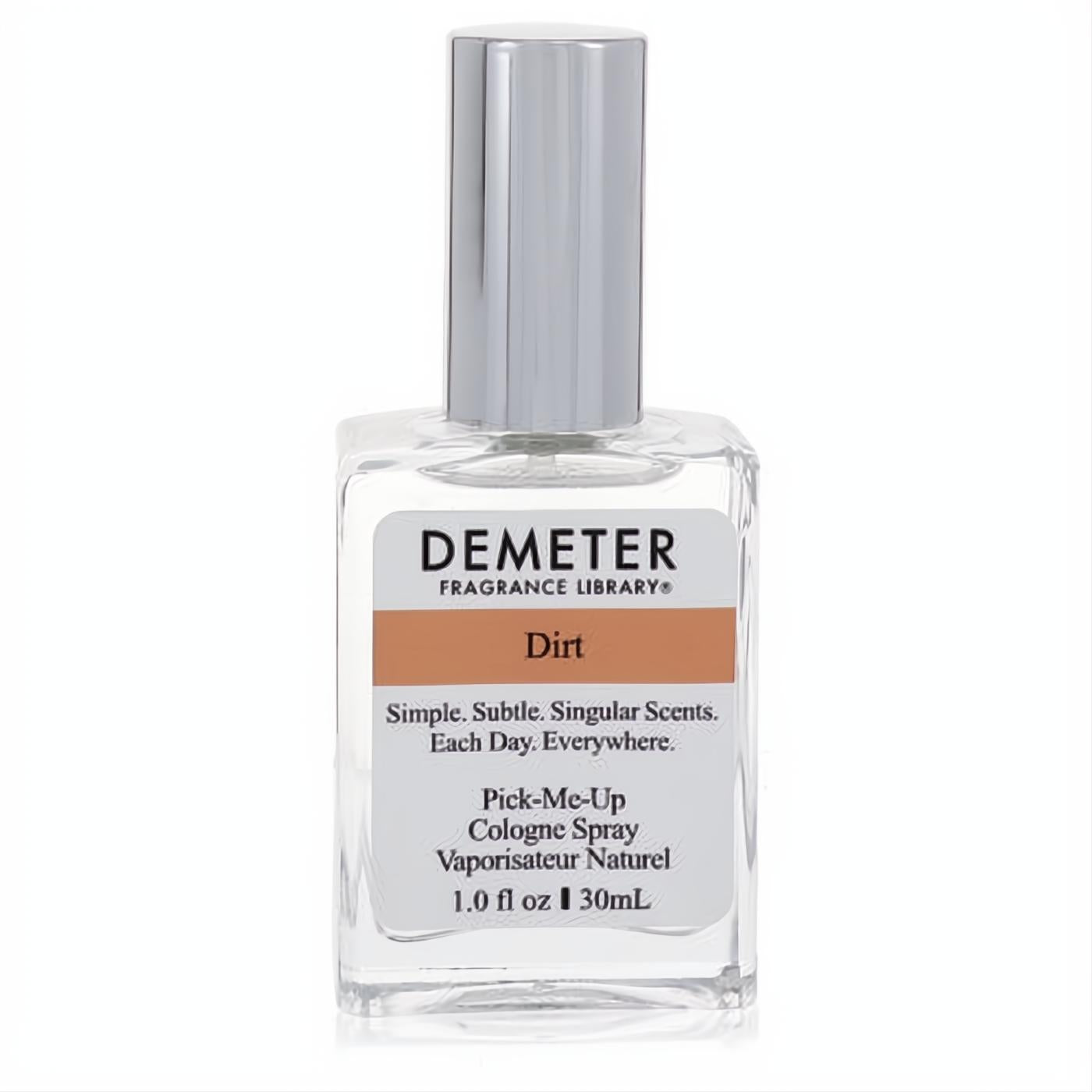 Demeter Dirt 1 oz cologne spray. Clear glass bottle, sleek silver cap, and a unique brown label highlighting the "Dirt" scent.