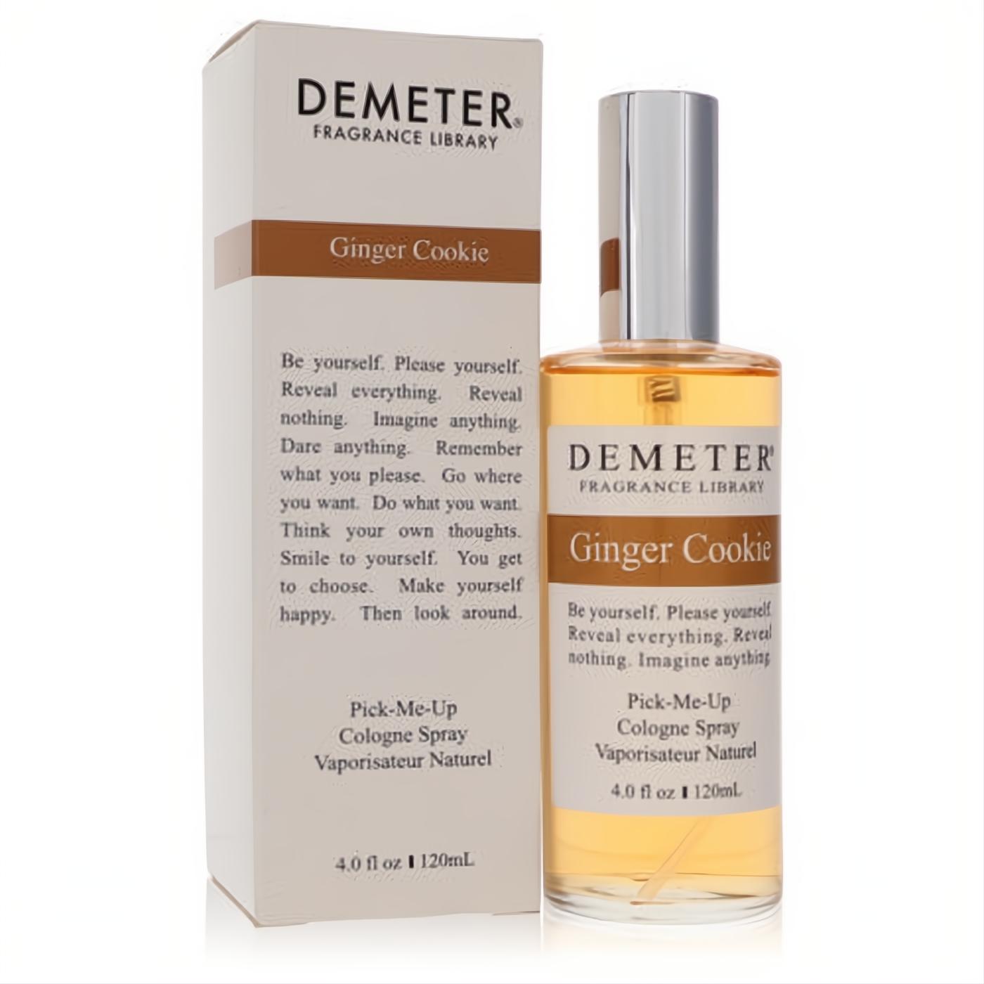 Demeter Ginger Cookie 4 oz cologne spray: clear glass bottle, warm amber fragrance, sleek silver cap, and elegant white box.