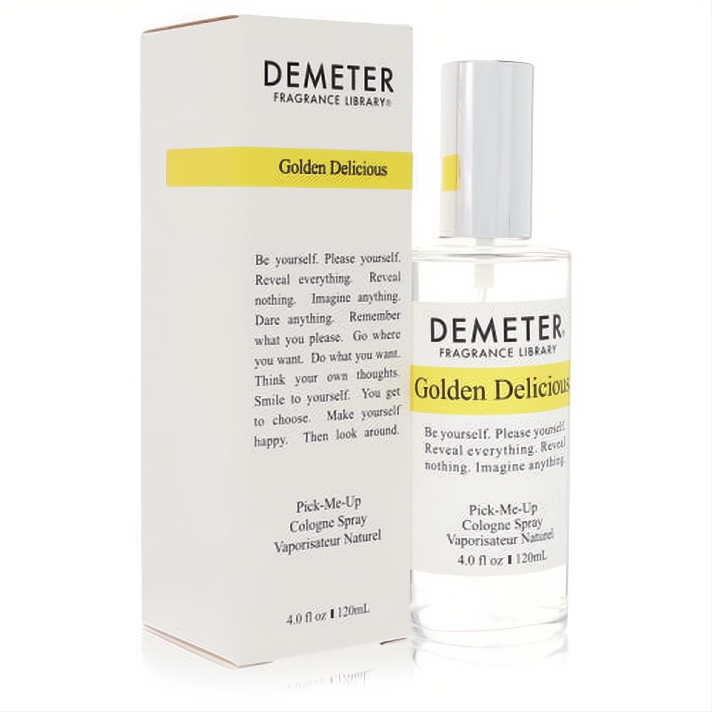 Crisp Demeter Golden Delicious 4 oz cologne spray in a clear glass bottle with silver cap, presented with its elegant white and yellow box.