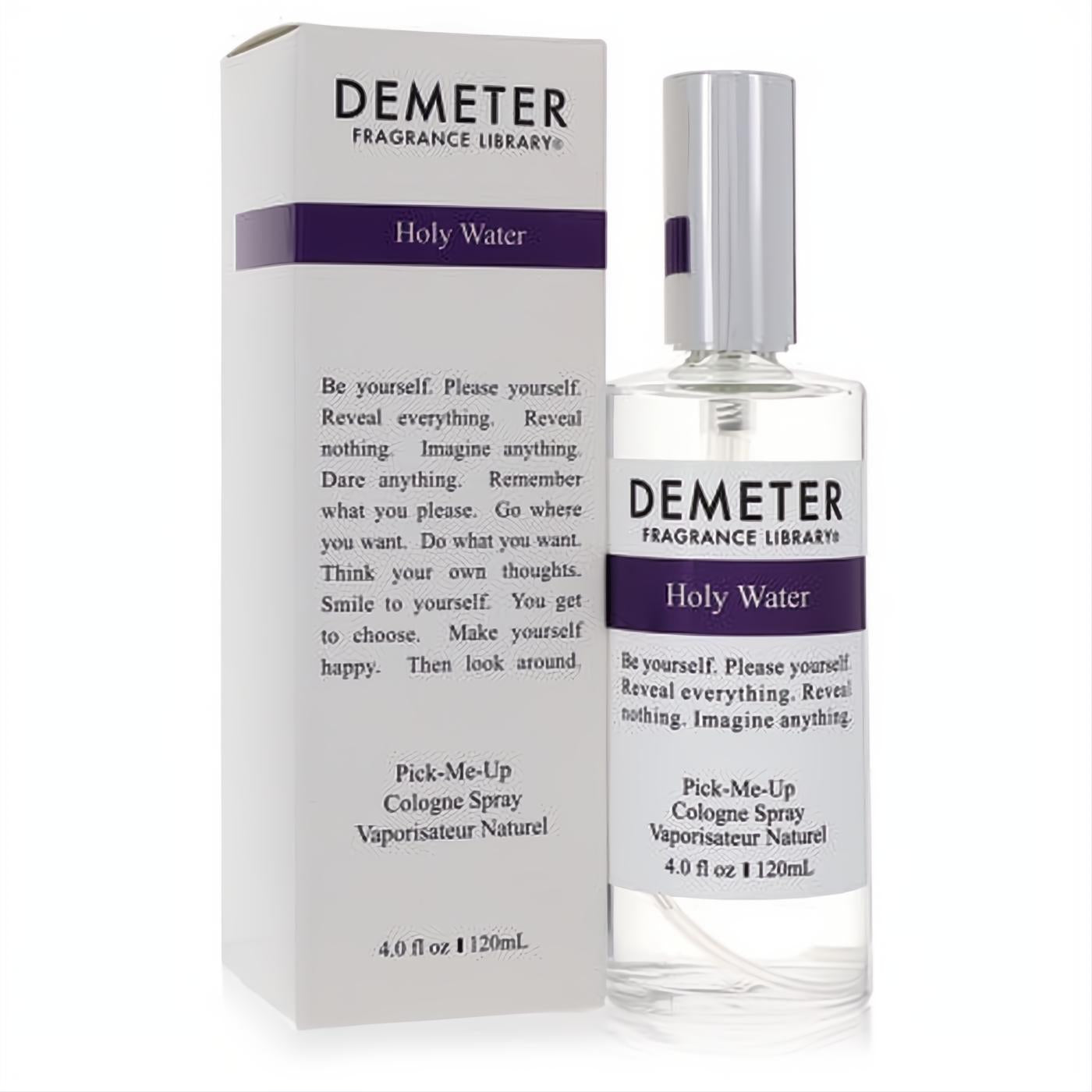 Demeter Holy Water 4 oz cologne spray in a sleek clear glass bottle with silver cap, beside its elegant white and purple box.
