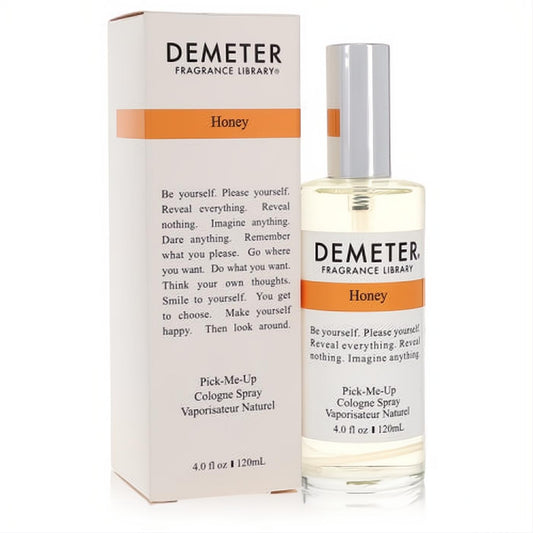 Demeter Honey 4 oz cologne spray: clear glass bottle with silver cap, alongside its elegant white box featuring a warm orange label.