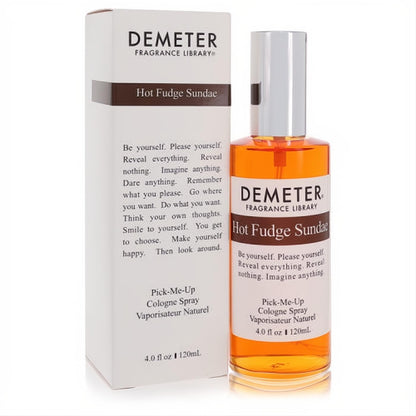 Experience Demeter Hot Fudge Sundae 4 oz cologne spray, a clear glass bottle with inviting amber liquid and elegant white box.