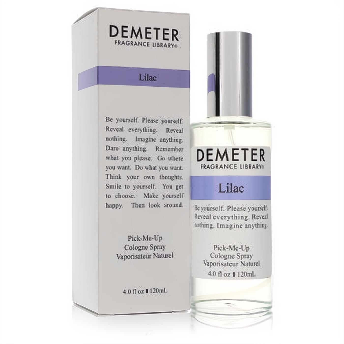 Demeter Lilac 4 oz women's fragrance spray. Clear glass bottle, sleek silver cap, and elegant white box with a vibrant purple label.