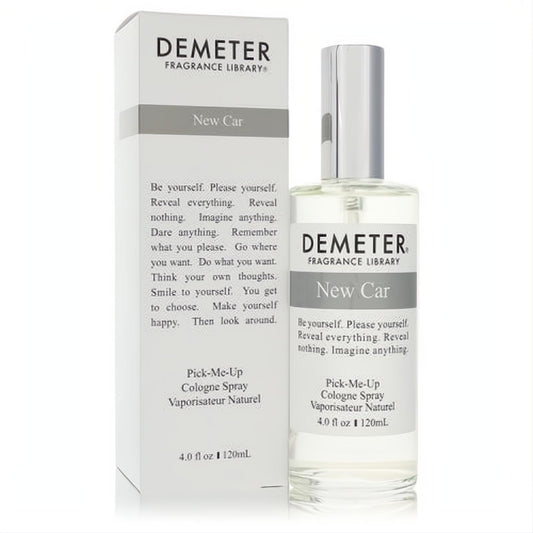 Demeter New Car 4 oz unisex cologne spray. Clear glass bottle with silver cap, displayed next to its elegant white and gray box.