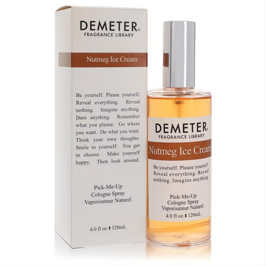 Demeter Nutmeg Ice Cream 4 oz cologne spray. Clear glass bottle with rich amber liquid, silver cap, and sleek white box.