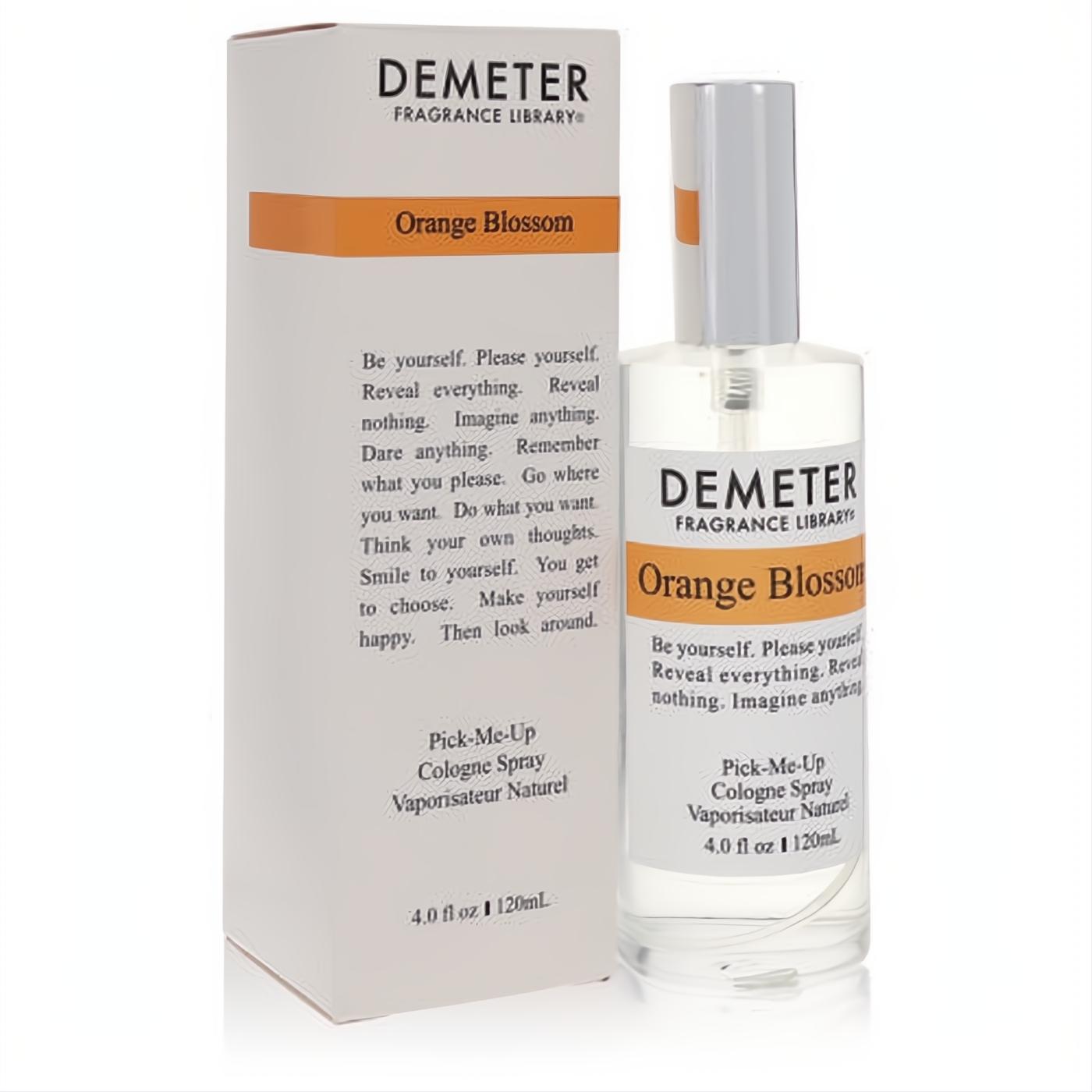 Demeter Orange Blossom 4 oz cologne spray. Sleek clear glass bottle with silver top and elegant white box, highlighted by bold orange labels.