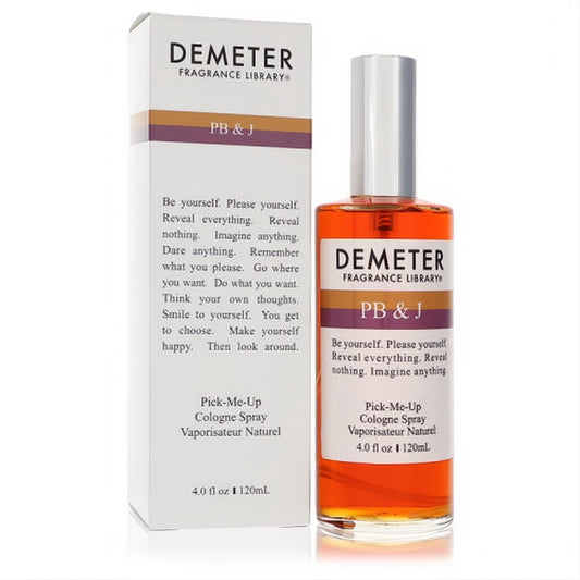 Demeter PB & J 4 oz unisex cologne spray. Clear glass bottle with amber liquid, silver cap, and matching white box with brown stripe.