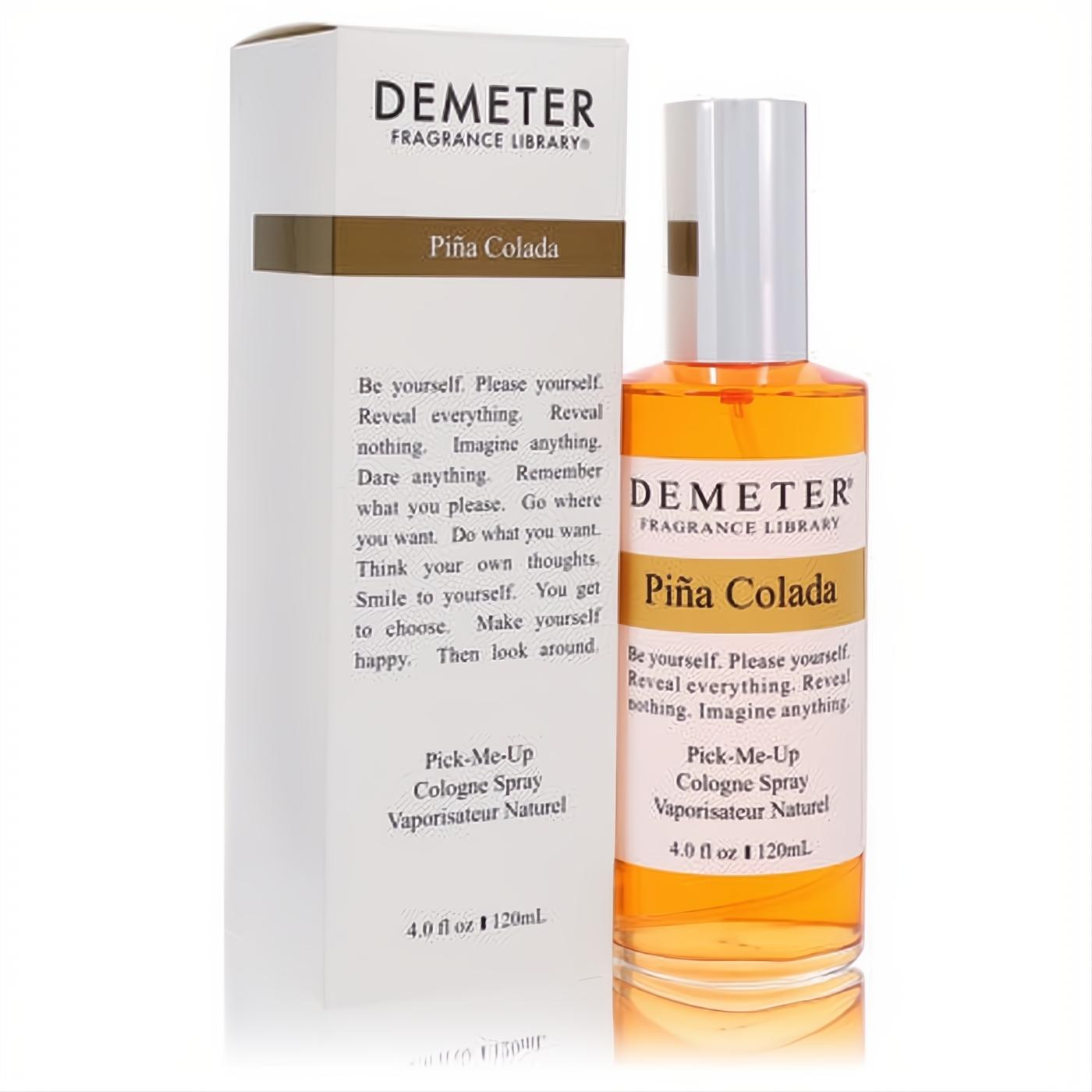 Demeter Pina Colada 4 oz cologne spray: clear glass bottle with vibrant amber liquid, white label, and silver cap, presented with its matching white box.